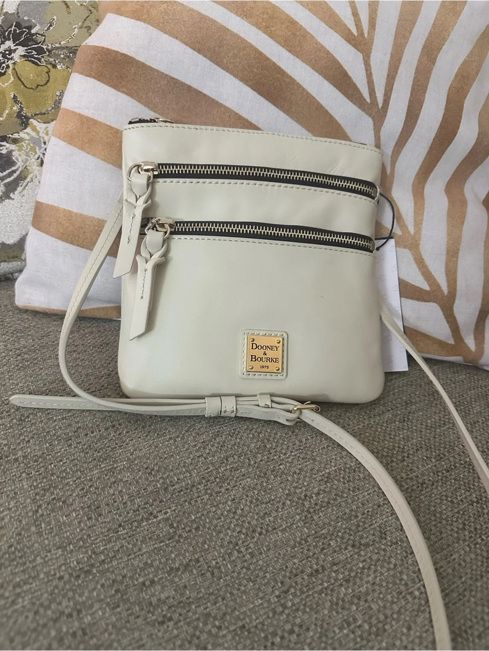 Dooney & Bourke Cream Triple-Zip Leather Crossbody